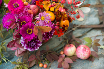Fototapeta na wymiar Autumn colors bouquet, fall flowers background