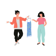 Fototapeta premium Man stylist holding a fashion dress for the woman