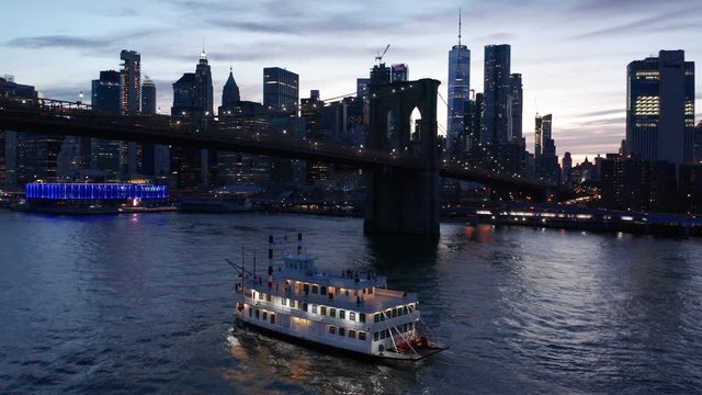 sunset orbiting counter clock around ferry as it nears downtown NYC