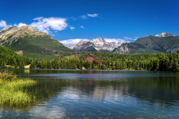 Naklejka na ściany i meble Mountain lake Strbske pleso (Strbske lake) and High Tatras national park, Slovakia