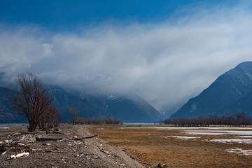 Russia. mountain Altai. Southern shore of lake Teletskoye near the mouth of the river Chulyshman
