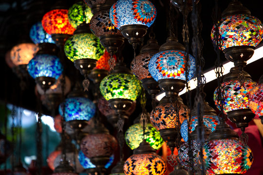 Shop with traditional mosaic multi colored turkish lamps or lanterns. Popular souvenir from Turkey. Istanbul