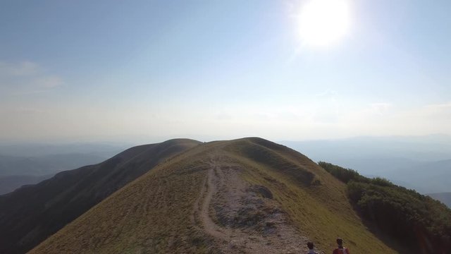 Drone view of two friends hiking in the Apennines, Umbria, Italy