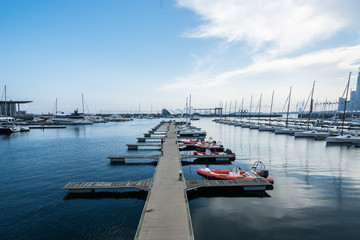 Sailing boats dock at the Olympic Sailing Center Pier in Qingdao, China