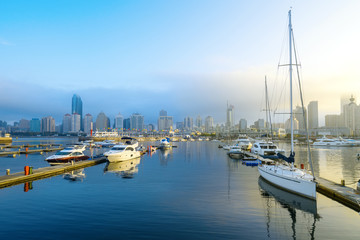 Sailing boats dock at the Olympic Sailing Center Pier in Qingdao, China