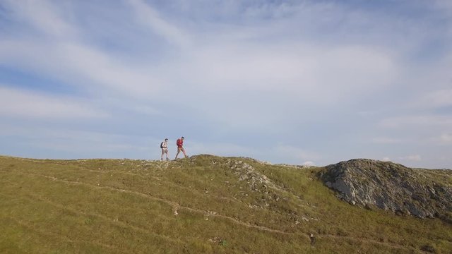 Drone view of two friends hiking in the Apennines, Umbria, Italy