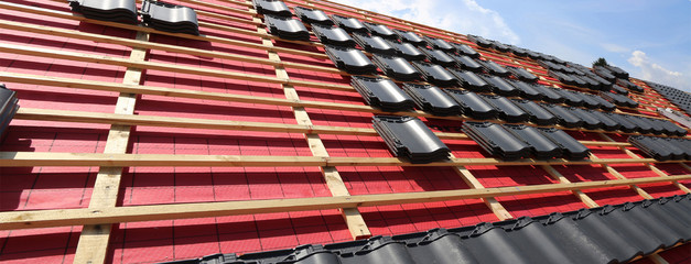 New roof covering in progress (Panoramic image)