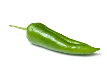 Closeup of organic green pepper on white background
