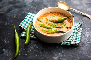 Hyderabadi mirch/mirchi ka Salan or green chilly sabzi or curry. Main course recipe from India. served in a bowl. selective focus