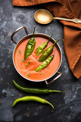 Hyderabadi mirch/mirchi ka Salan or green chilly sabzi or curry. Main course recipe from India. served in a bowl. selective focus