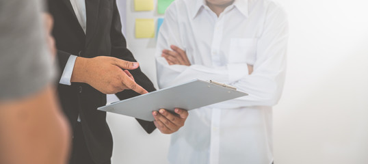 Image Panoramic close up hands of brainstorming group business people meeting to discuss the situation on the market. Business meeting successful concept.
