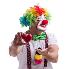 Funny clown with a heart isolated on white background