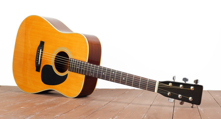 Musical instrument - Classic acoustic guitar wood and white background