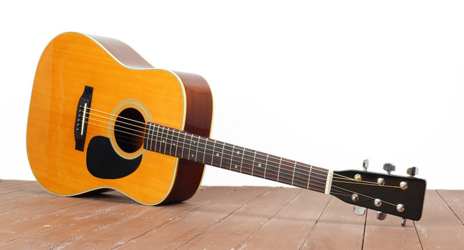 Musical instrument - Classic acoustic guitar wood and white background