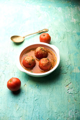 Tomato Salan or Tamatar sabzi or curry. Main course recipe from India. served in a bowl. selective focus