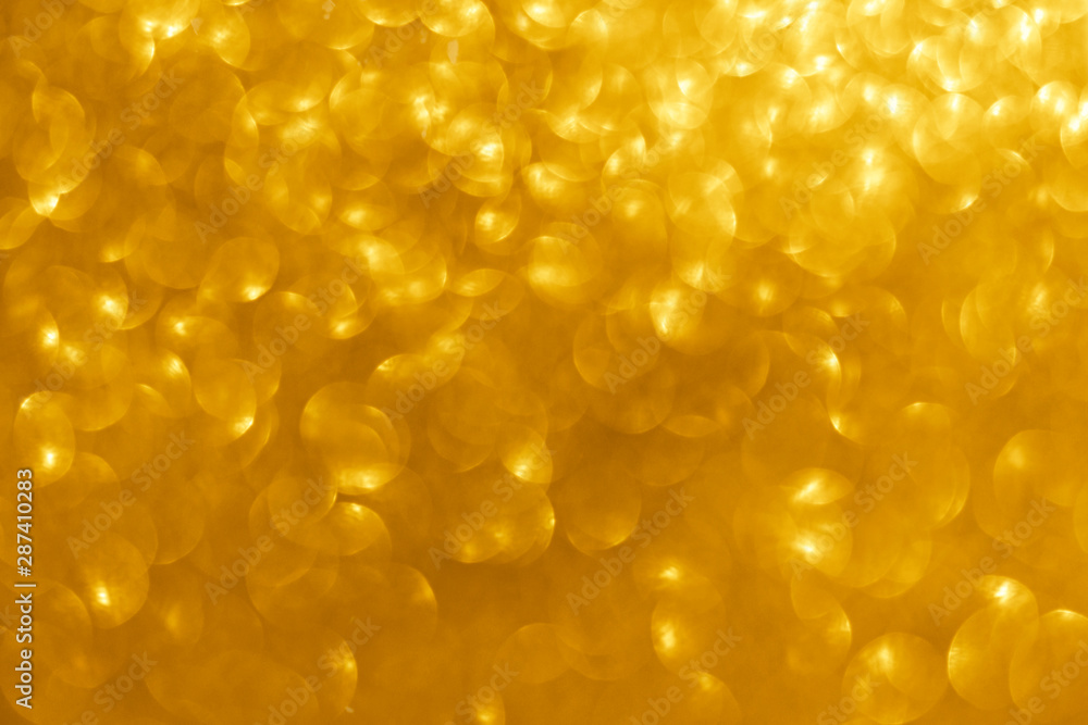 Poster abstract gold sparkles shiny defocused gold bokeh lights background use us gold luxury background fo