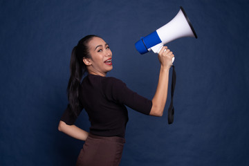 Beautiful young Asian woman announce with megaphone.