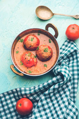 Tomato Salan or Tamatar sabzi or curry. Main course recipe from India. served in a bowl. selective focus