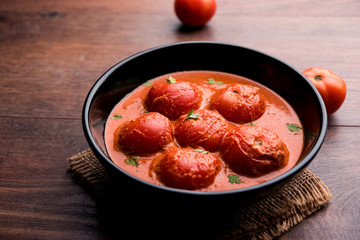 Tomato Salan or Tamatar sabzi or curry. Main course recipe from India. served in a bowl. selective focus
