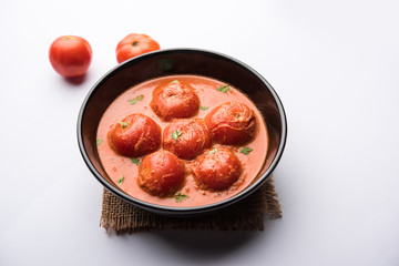 Tomato Salan or Tamatar sabzi or curry. Main course recipe from India. served in a bowl. selective focus
