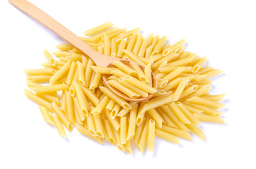 Pasta penne on wooden spoon isolated on white background.