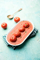 Tomato Salan or Tamatar sabzi or curry. Main course recipe from India. served in a bowl. selective focus