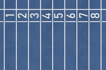Top view of the blue rubber running track texture with markings on the Olympic stadium