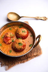 Tomato Salan or Tamatar sabzi or curry. Main course recipe from India. served in a bowl. selective...