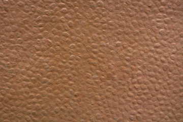 Rough buffalo leather texture. Empty brown surface close-up for design and backdrop