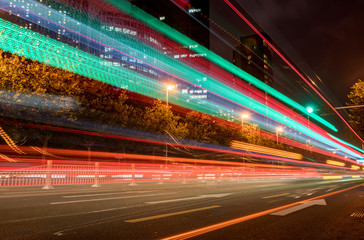 Fototapeta na wymiar abstract image of blur motion of cars on the city road at night