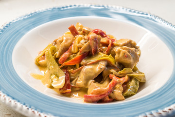 Butter Chicken Curry with Cream and Vegetables in Plate Ready to Serve
