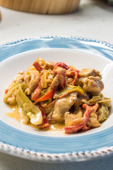 Butter Chicken Curry with Cream and Vegetables in Plate Ready to Serve