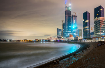 Beach and beautiful city skyline at night, Qingdao, China