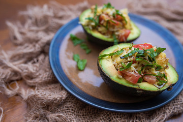 Avocado salad with basil, tomato, cheese and balsamic glaze