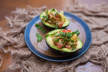 Avocado salad with basil, tomato, cheese and balsamic glaze