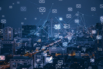 Night city backdrop with email network