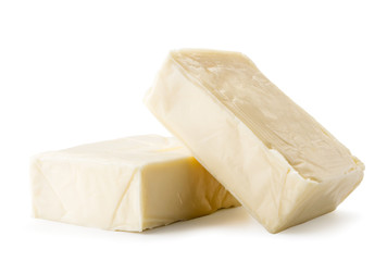 Two pieces of cream cheese rectangular on a white, isolated.
