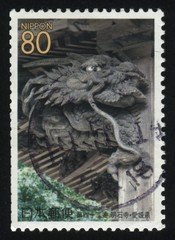 RUSSIA KALININGRAD, 18 MARCH 2016: stamp printed by Japan, shows a sculpture of a dragon, circa 2009