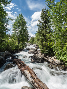 Snow melt cascades leading to Taggart Lake, Grand Teton National Park, Wyoming
