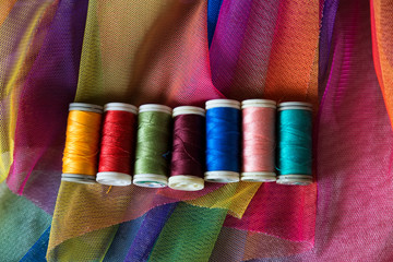 the colorful ropes on the hand on background.