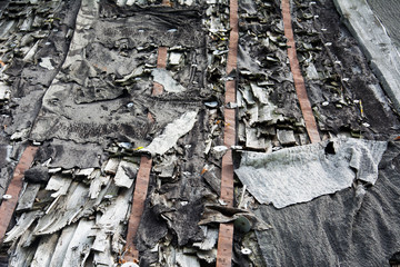 old ruined roof of an abandoned rotten building