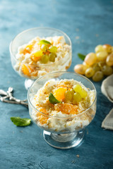 Homemade rice pudding with fresh orange