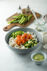 Rice bowl with salmon and edamame beans