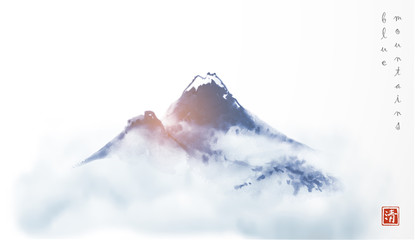 Big blue Fujiyama mountain in dense mist. Traditional Japanese ink wash painting sumi-e. Hieroglyph - clarity. © elinacious