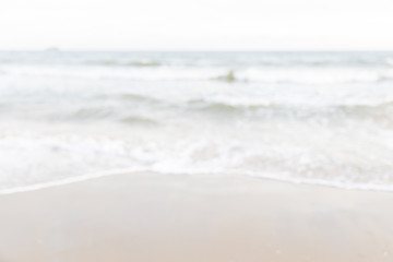 defocused or blurry of empty beach and tropical sea with sky background.