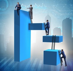 Businessman climbing blocks in challenge business concept