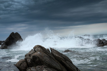 waves crashing on rocks