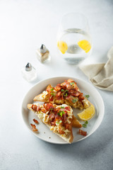 Scrambled eggs with bacon on toast