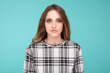 Fototapeta premium Female model isolated over the blue background
