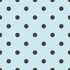 Seamless vector pattern with cute tile black polka dots on pastel blue background